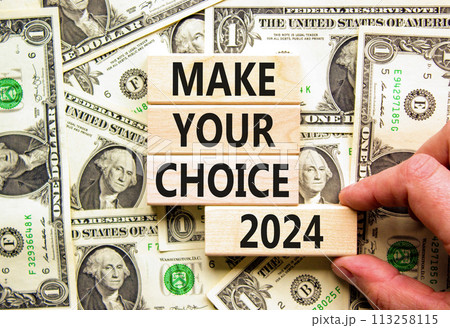 Make your choice 2024 symbol. Concept words Make your choice 2024 on beautiful wooden block. Beautiful dollar bills background. Voter hand. Business Make your choice 2024 concept. Copy space. Make your choice 2024 symbol. Concept words Make your choice 2024 on beautiful wooden block. Beautiful dollar bills background. Voter hand. Business Make your choice 2024 concept. Copy space. 113258115