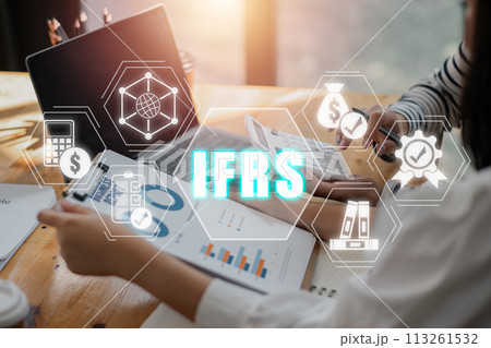 IFRS, International Financial Reporting Standards concept, Business team analyzing income charts and graphs with International Financial Reporting Standards icon on virtual screen. 113261532