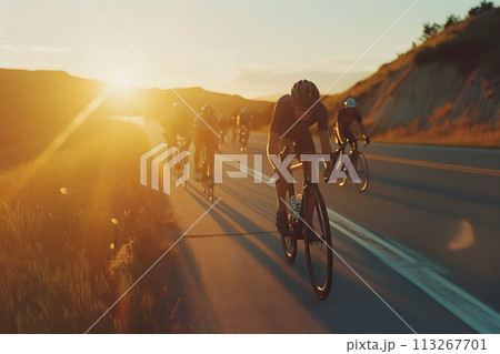 Twilight Ride: Adventure-Seeking Cyclists Tackle Mountainous Terrain Twilight Ride: Adventure-Seeking Cyclists Tackle Mountainous Terrain 113267701