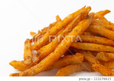 Cajun French fries on a white background Cajun French fries on a white background 113276615
