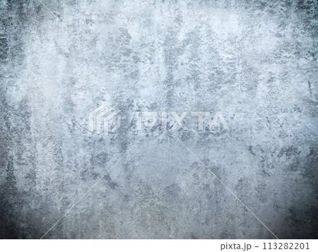 Grunge style. Close-up photo of concrete texture detail, There is a vignette at the corner of the image and a bright spot in the center is a copyspace. The gray and dark cement background is old. 113282201