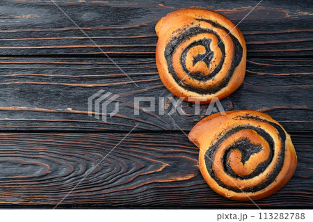 Homemade bun with poppy seeds 113282788