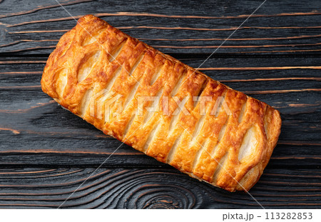 Golden Puff pastry stuffed with sausage and cheese Golden Puff pastry stuffed with sausage and cheese 113282853