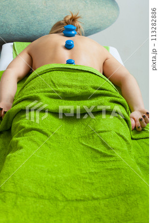 Massage with cupping glass in beautician Massage with cupping glass in beautician 113282886