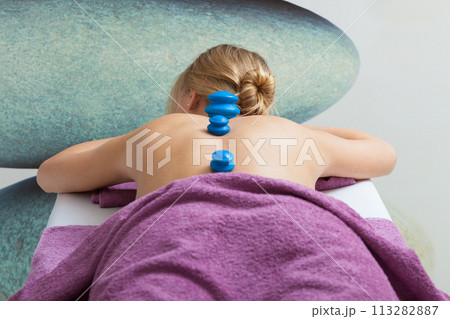 Massage with cupping glass in beautician Massage with cupping glass in beautician 113282887