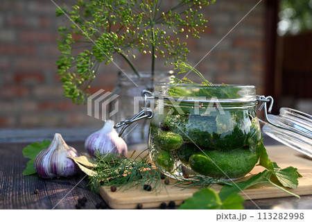 a set of ingredients for pickling cucumbers, pickled cucumbers, brine. a set of ingredients for pickling cucumbers, pickled cucumbers, brine. 113282998
