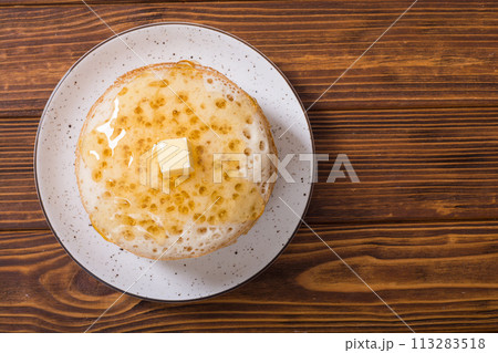 Moroccan traditional eating . Pancakes with honey Moroccan traditional eating . Pancakes with honey 113283518