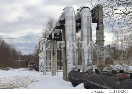 The main provides the city with hot water. Selective focus. The large pipes  113284203