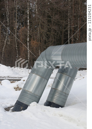 The main provides the city with hot water. Selective focus. The large pipes The main provides the city with hot water. Selective focus. The large pipes 113284231