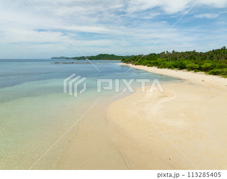 Aerial view of clear water on sandy beach in Santa Fe, Tablas, Romblon. Philippines. Aerial view of clear water on sandy beach in Santa Fe, Tablas, Romblon. Philippines. 113285405