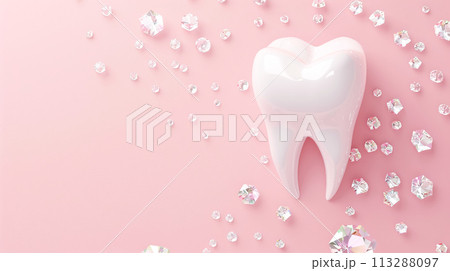 Model of a white human tooth, molar and jewelry made of small sparkling stones, diamond rhinestones pink background. The concept of dental care and health, dental decoration  113288097