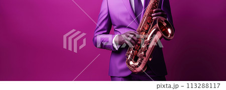 A saxophonist playing jazz music. Close-up of musician's hands elegantly holding saxophone, focusing on the instrument and the details of his violet concert outfit 113288117