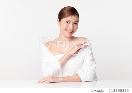 Beautiful young asian woman with clean fresh skin on white background, Face care, Facial treatment, Cosmetology, beauty and spa, Asian women portrait. Beautiful young asian woman with clean fresh skin on white background, Face care, Facial treatment, Cosmetology, beauty and spa, Asian women portrait. 113290336