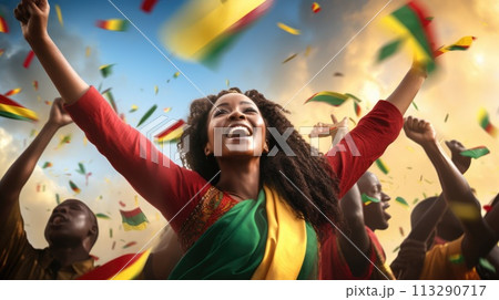 African American woman with raised arms in the air celebrating Juneteenth Freedom and African liberation day. Black life matters. Black history month. 113290717