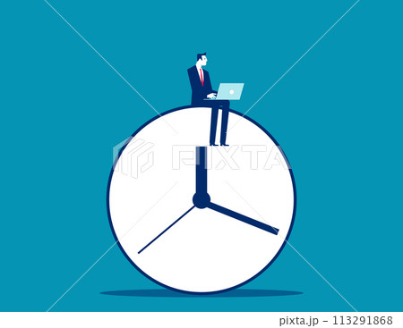 Sitting on clock working. After hours worker 113291868