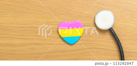 Pansexual Pride Day and LGBT pride month concept. pink, yellow and blue heart shape with Stethoscope for Lesbian, Gay, Bisexual, Transgender, Queer and Pansexual community Pansexual Pride Day and LGBT pride month concept. pink, yellow and blue heart shape with Stethoscope for Lesbian, Gay, Bisexual, Transgender, Queer and Pansexual community 113292847