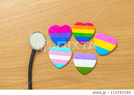 LGBT pride month concept or LGBTQ+ or LGBTQIA+. rainbow and colorful heart shape with Stethoscope for Lesbian, Gay, Bisexual, Transgender, Queer and Pansexual community 113293189