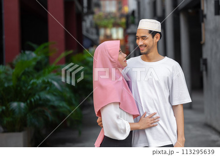 portrait happy muslim teen man and women couple lover friend standing together enjoy fun lifestyle outdoors portrait happy muslim teen man and women couple lover friend standing together enjoy fun lifestyle outdoors 113295639