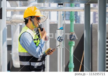 engineer man working with water pipe line in gas oil industry workplace 113295721