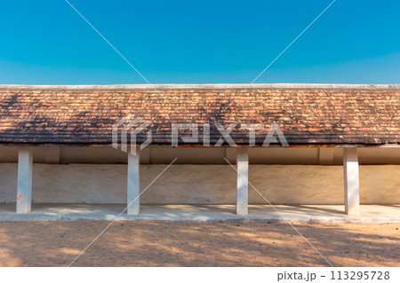 Lanna style eaves roof walk path way traditional architecture in historic place old northern asian temple roofing building design for background Lanna style eaves roof walk path way traditional architecture in historic place old northern asian temple roofing building design for background 113295728