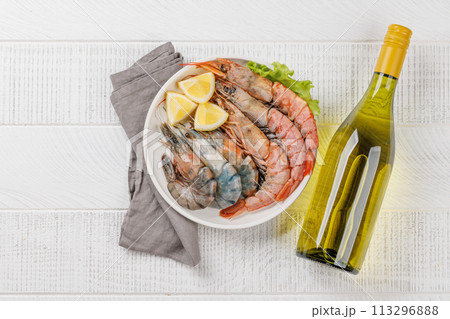 Raw shrimps on plate Raw shrimps on plate 113296888