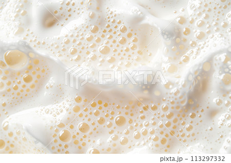Close up of soapy foam texture as a background. Macro shot of bubbles with shimmering effect on the surface 113297332
