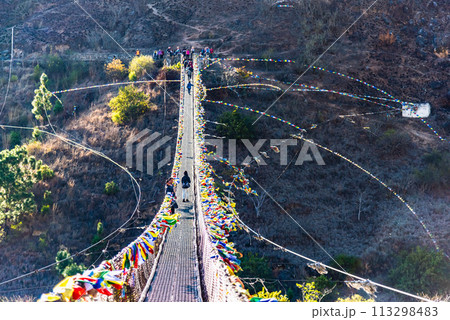 The Punakha Suspension Bridge at the Punakha Dzong in Bhutan. The Punakha Suspension Bridge at the Punakha Dzong in Bhutan. 113298483