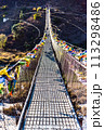 The Punakha Suspension Bridge at the Punakha Dzong in Bhutan. 113298486