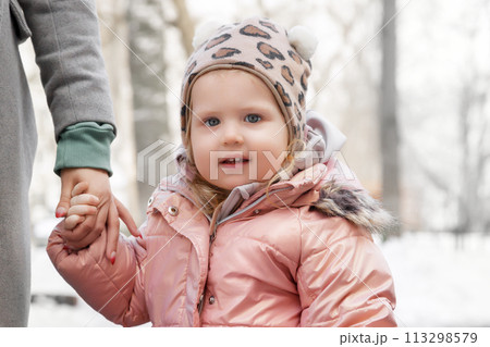 Beauty cute baby . Adorable girl having fun on a 113298579