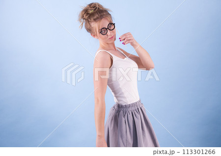 Elegant woman pretending wearing eyeglasses Elegant woman pretending wearing eyeglasses 113301266