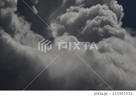 Cloudscape scenery, overcast weather above dark blue sky. Storm clouds floating in a rainy dull day with natural light. White and grey scenic environment background. Nature view. 113303552