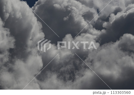 Cloudscape scenery, overcast weather above dark blue sky. Storm clouds floating in a rainy dull day with natural light. White and grey scenic environment background. Nature view. 113303560