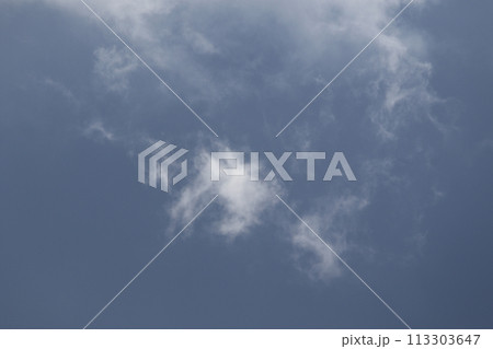 Cloudscape scenery, overcast weather above dark blue sky. Storm clouds floating in a rainy dull day with natural light. White and grey scenic environment background. Nature view. Cloudscape scenery, overcast weather above dark blue sky. Storm clouds floating in a rainy dull day with natural light. White and grey scenic environment background. Nature view. 113303647