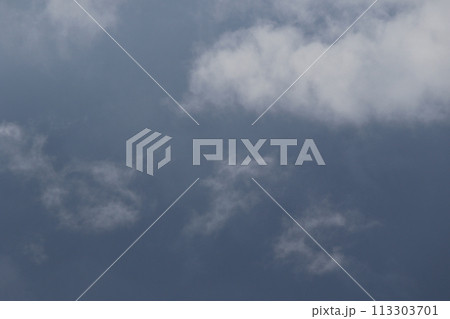 Cloudscape scenery, overcast weather above dark blue sky. Storm clouds floating in a rainy dull day with natural light. White and grey scenic environment background. Nature view. Cloudscape scenery, overcast weather above dark blue sky. Storm clouds floating in a rainy dull day with natural light. White and grey scenic environment background. Nature view. 113303701