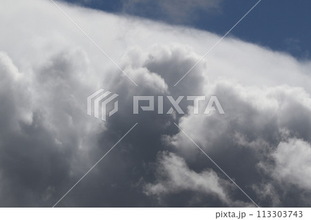 Cloudscape scenery, overcast weather above dark blue sky. Storm clouds floating in a rainy dull day with natural light. White and grey scenic environment background. Nature view. 113303743