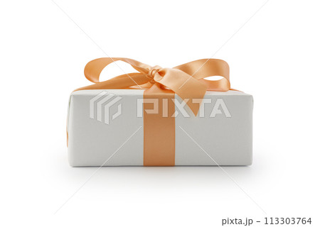White gift box with orange ribbon bow isolated on white background White gift box with orange ribbon bow isolated on white background 113303764