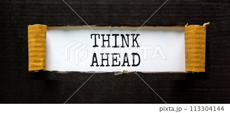 Think ahead symbol. Concept words Think ahead on beautiful white paper on a beautiful black background. Business, support, motivation psychological and think ahead concept. Copy space 113304144