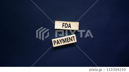 FDA Food and Drug Administration payment symbol. Concept words FDA payment on beautiful wooden blocks. Beautiful black table black background. Business FDA payment concept. Copy space. FDA Food and Drug Administration payment symbol. Concept words FDA payment on beautiful wooden blocks. Beautiful black table black background. Business FDA payment concept. Copy space. 113304250