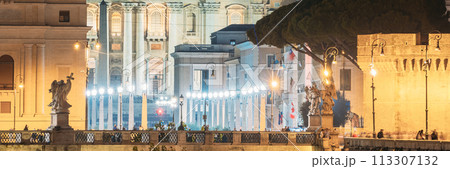 Rome, Italy. St. Peter's Square With Papal Basilica Of St. Peter In The Vatican And Aelian Bridge In Evening Night Illuminations 113307132