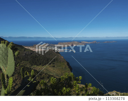 View of Ponta de Sao Lourenco and Island Ilheu da Cevada or Ilheu do Farol, the most easterly point on Madeira - seen from Pico do Facho Viewpoint, Madeira, Portugal 113308278
