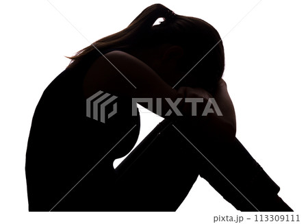 Young woman with grief dropped his arms 113309111