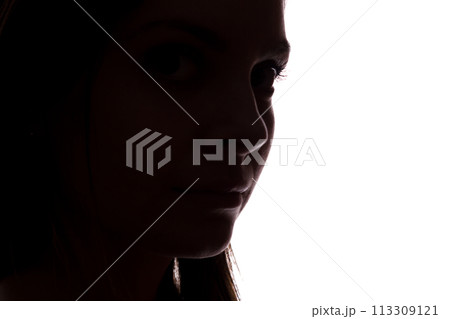 Silhouette of a young woman Silhouette of a young woman 113309121