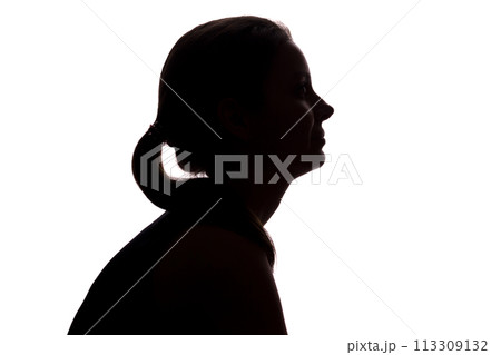 Young woman looking up - horizontal silhouette 113309132