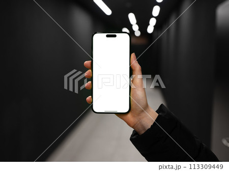 Berlin Germany January 21 2024 Hand holding smartphone mockup, blank mobile phone, iphone screen 113309449