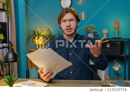 Conflict quarrel negotiation angry mad business man engaged in webcam online video at home office 113310716