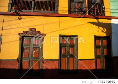 Beautiful facade of the houses at the historical downtown of the heritage town of Salamina located at the Caldas department in Colombia. 113313643