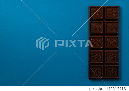 Chocolate bar pieces. Background with chocolate. Sweet food photo concept. Chocolate bar pieces. Background with chocolate. Sweet food photo concept. 113317918
