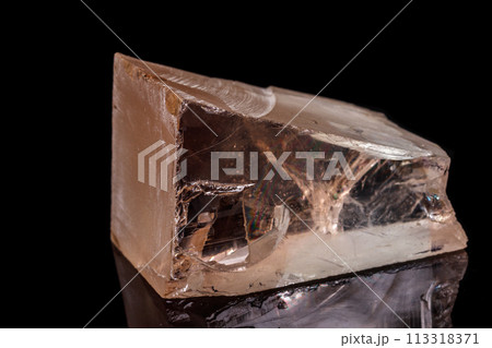 macro mineral stone Topaz on a black background macro mineral stone Topaz on a black background 113318371