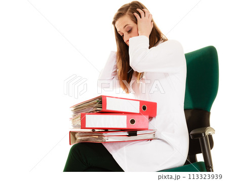 Paperwork. Overworked doctor woman with documents 113323939