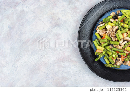 Spring salad with asparagus and mushroom. Spring salad with asparagus and mushroom. 113325562